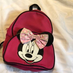 TLC needed on bow Minnie Mouse mini bckpk